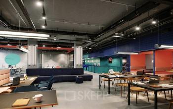 Modern and vibrant office space rental at Nordbahnstraße 47, 1020 Vienna Leopoldstadt, with stylish furniture and colorful accents.