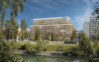 Moderner Bürokomplex in Obere Donaustraße 23-29, 1020 Wien, ideal zum Bürofläche mieten, umgeben von grüner Umgebung mit zeitgenössischem Design und großen Glasfenstern.