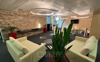 Contemporary office space rental at Am Euro Platz 2, 1120 Vienna Meidling with stylish furnishings and open layout for a collaborative work environment.