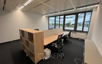 Modern office space rental at Am Euro Platz 2, 1120 Vienna Meidling with well-equipped workstations and natural light.