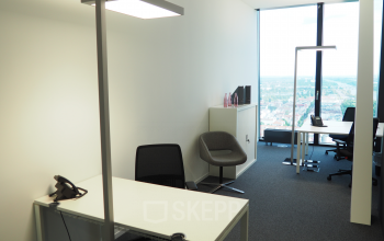 Modern corner workstation with a view in an office space rental at Donau-City-Straße 7, 1220 Vienna Donaustadt.