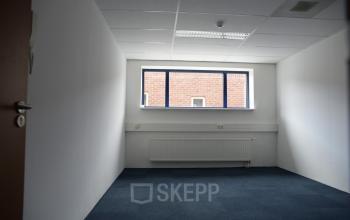 Modern conference room available for office space rental at Hollandse Kade 38, Abcoude, featuring sleek furniture and ample lighting.