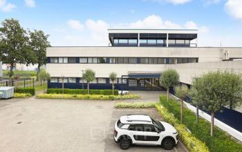 Exterior view of office building at Markerkant 1310, Almere Stad, Almere, with parking in front.