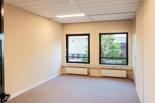 Unfurnished office space with large windows at Jool Hulstraat 2-14, Almere Stad, perfect for rent office space needs.