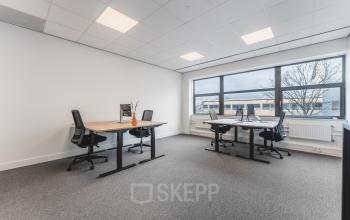 Bright and airy office space at Veluwezoom 15, Almere Stad, featuring modern desks and chairs, perfect for office space rental.