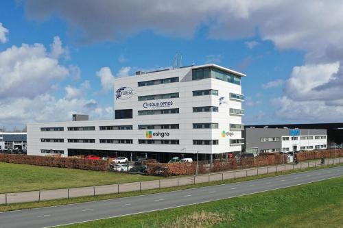 Exterior view of office building at Veluwezoom 15, Almere Stad, ideal for office space rental.