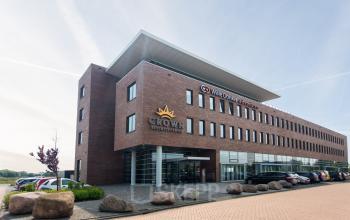 Exterior view of an office building at Leidse Schouw 2, Alphen aan den Rijn, ideal for office space rental.