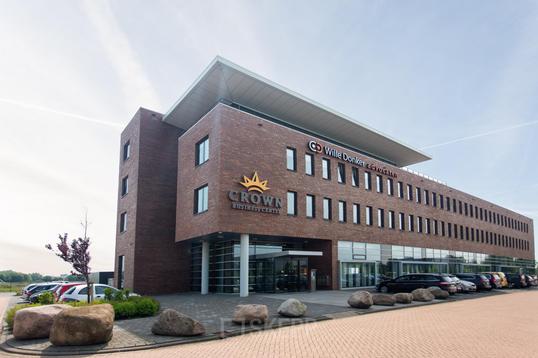Exterior view of an office building at Leidse Schouw 2, Alphen aan den Rijn, ideal for office space rental.