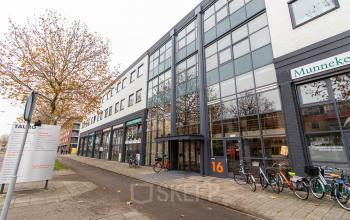 Exterior view of Europalaan 16 in Alphen aan den Rijn, featuring a modern building facade with ample windows, suitable for office space rental.
