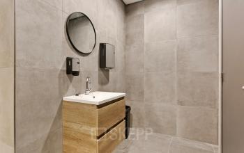 Modern restroom at Astronaut 28, Amersfoort Calveen, suitable as part of the office space rental.