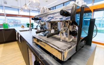 Modern pantry in the office space rental at Smallepad 32, Amersfoort Centraal Station, featuring a large coffee machine and ample counter space.