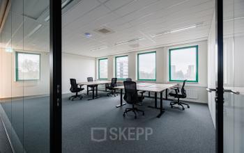 Spacious, bright office to rent at Stadsring 201, Amersfoort Centrum, featuring multiple desks and chairs, suitable for collaborative work activities.
