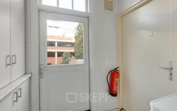 Interior view of the Stadsring 248-250 office space in Amersfoort Centrum, featuring a fire door and storage cabinets, ideal for office space rental.