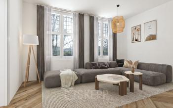 Stylish lounge area at office space rental on Stadsring 248-250, Amersfoort Centrum, featuring a comfortable seating arrangement, large windows, and modern decor that creates a welcoming atmosphere.