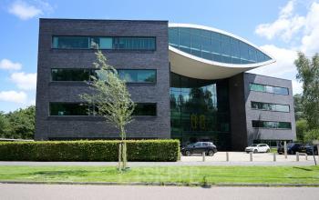 Exterior view of the office building at Prof. W.H. Keesomlaan 12, Amstelveen, suitable for office space rental.