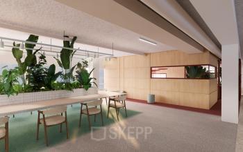 Furnished office space at Stroombaan 4 in Amstelveen with tables, chairs, and greenery, ideal for office space rental.