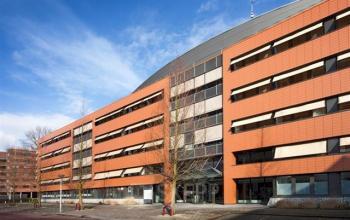 Exterior view of the office building at Stroombaan 4, Amstelveen, Amstelveen, featuring modern architecture and large glass windows.