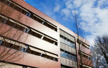 The exterior of the office building at Stroombaan 4, Amstelveen, featuring a modern facade with large windows.