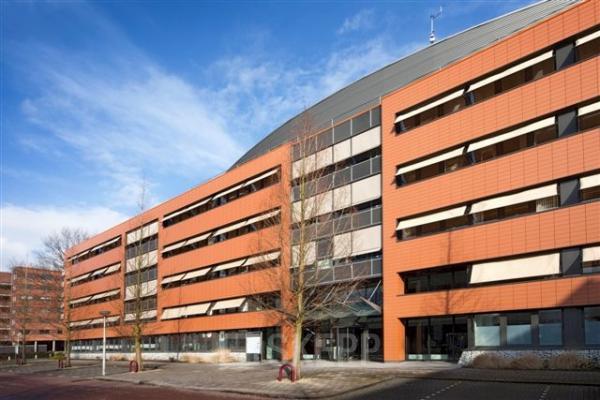 Exterior view of the office building at Stroombaan 4, Amstelveen, Amstelveen, featuring modern architecture and large glass windows.