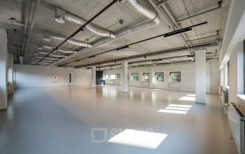Interior view of an open floorplan office space at Joop Geesinkweg 601, Amsterdam Amstel Business Park available for office space rental.