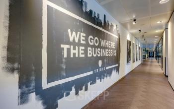 Contemporary hallway at Prins Bernhardplein 200, Amsterdam Amstel; features motivational wall art ideal for a rented office space.
