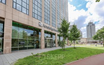 Exterior view of Amstelgebouw at Prins Bernhardplein 200, Amsterdam Amstel, showcasing office space rental opportunities.
