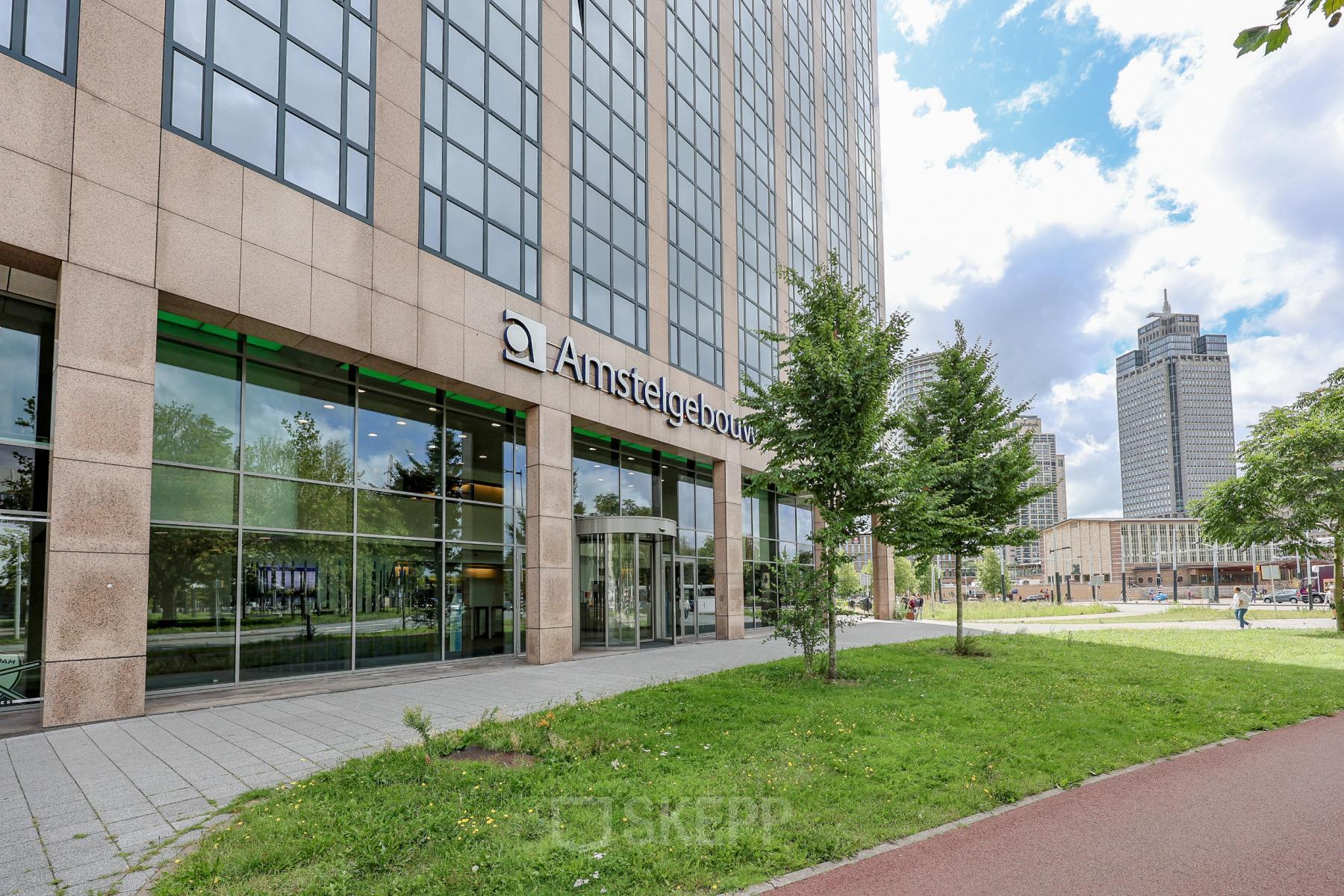 Exterior view of Amstelgebouw at Prins Bernhardplein 200, Amsterdam Amstel, showcasing office space rental opportunities.