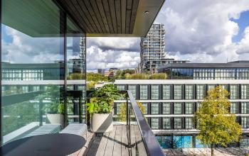 Balcony view at Zwaansvliet 1, showcasing modern office buildings in Amsterdam Buitenveldert available for office space rental.