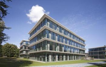 Modern office building with large glass windows at De Cuserstraat 91, Amsterdam Buitenveldert, offering office space rental options.