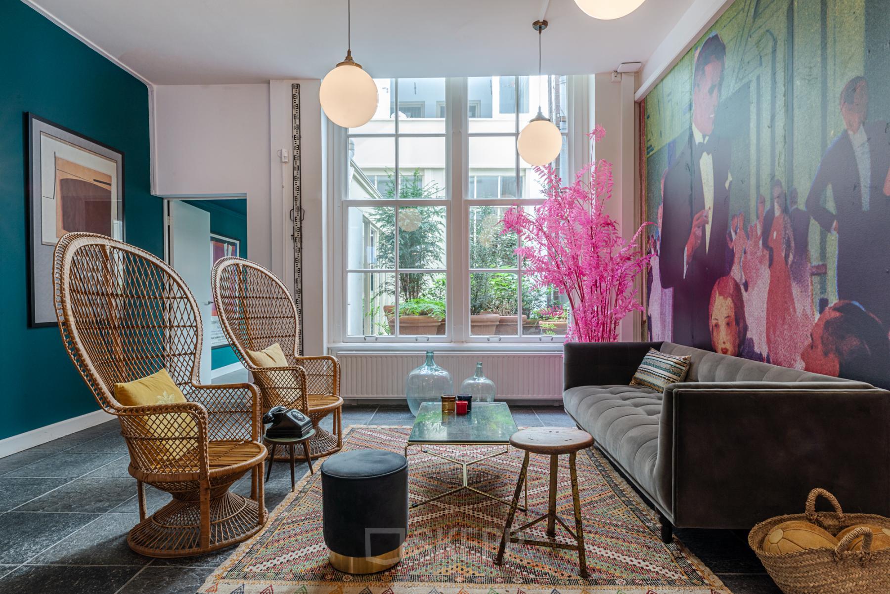 Creative workspaces with modern decor and natural light at office to rent in Nieuwezijds Voorburgwal 296-298, Amsterdam Center, Amsterdam.