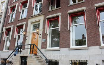 Exterior view of an office building at Singel 126 in Amsterdam Center, ideal for office space rental.