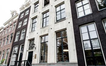 Office building exterior located at Keizersgracht 241, in Amsterdam Center, Amsterdam. The space is perfect for businesses looking for office space rental in a historic and lively area.