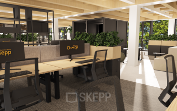 Modern office space in Amsterdam Center featuring open workstations with sleek chairs and monitors, ideal for office space rental. Natural light streams through large windows overlooking greenery.