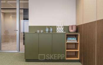 Modern office interior with minimalist decor at Piet Heinkade 55, ideal for office space rental in Amsterdam Center.