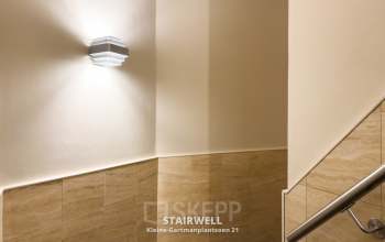 Stairwell at Kleine Gartmanplantsoen 21, Amsterdam Center, highlighting modern details. This location is part of a vibrant office space rental opportunity.