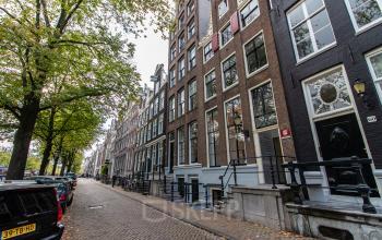 Street view of Keizersgracht 62-64 in Amsterdam Canal Belt, showcasing classic canal-side architecture.