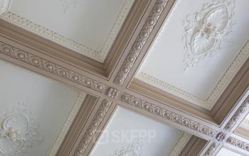 Elegant ornamental ceiling detailing within office space rental at Herengracht 282, Amsterdam Canal Belt.