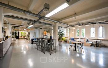 Bright, open office space with modern furnishings and ample seating at Van Diemenstraat 20-200, Amsterdam Houthavens.