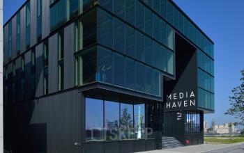 Modern office building exterior at Moermanskkade 109-113, Amsterdam Houthavens, ideal for office space rental.
