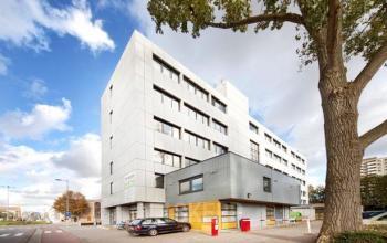 Exterior view of office building located at Postjesweg 175, Amsterdam New-West, available for office space rental.