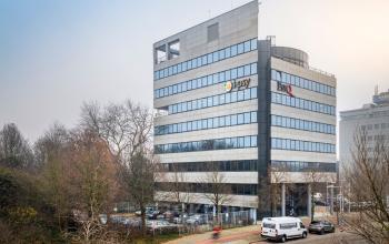 Exterior view of an office building at Overschiestraat 61, in Amsterdam New-West, available for office space rental.