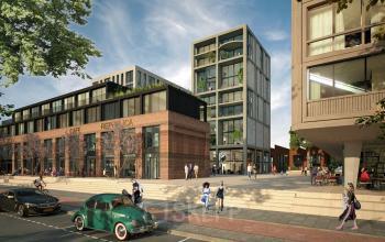 Exterior view of Papaverhof 58 in Amsterdam North with people walking and cycling outside modern office to rent.