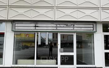 Exterior view of the office building at Buikslotermeerplein 430, Amsterdam North featuring modern facade with large windows, available for office space rental.