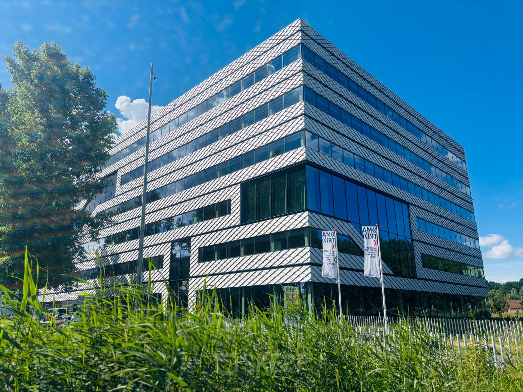 Modern office building at Science Park 301, suitable for rent office space in Amsterdam East.