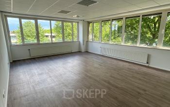 Spacious office to rent at James Wattstraat 71, Amsterdam East, featuring large windows and natural light, ideal for office space rental.