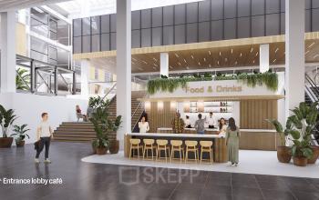 Lobby area with a 'Food & Drinks' bar at Jacob Bontiusplaats 9, Amsterdam East, featuring modern seating and plants, part of an office space rental.