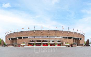 Exterior view of Olympisch Stadion 24-28 in Amsterdam Old South, available for office space rental.