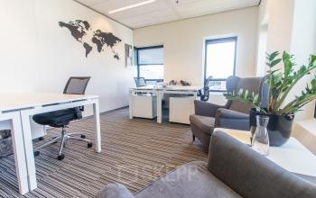 Spacious office at Radarweg 29 in Amsterdam Sloterdijk, featuring modern furnishings and multiple workstations suitable for office space rental.