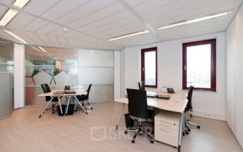 Modern office space rental at Kingsfordweg 151, Amsterdam Sloterdijk with a well-lit interior and organized workstations.