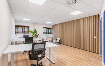 Bright office to rent at Arlandaweg 92, Amsterdam Sloterdijk, featuring modern workspaces with natural light and stylish furnishings.